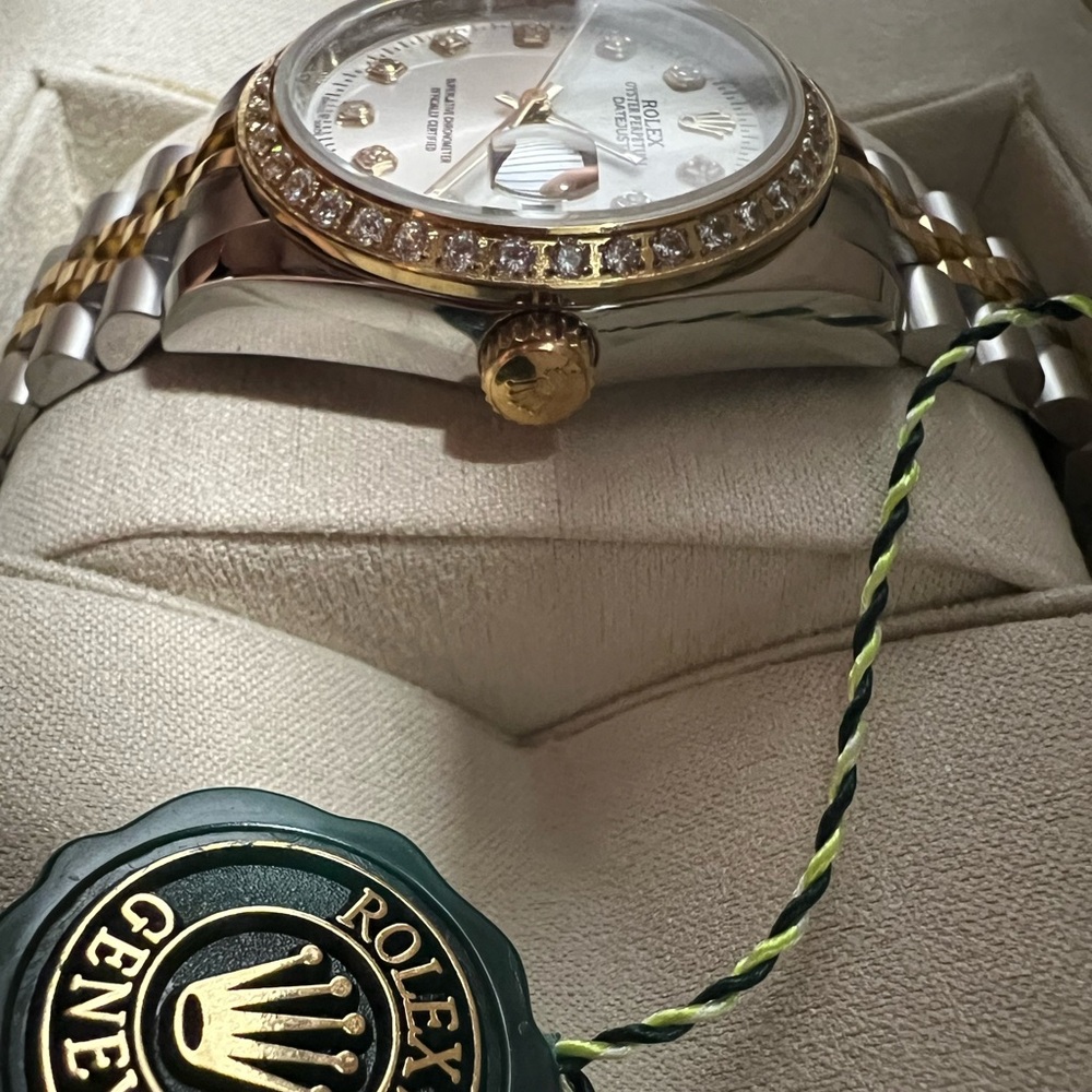 Rolex Gold and Silver Timepiece with Signature Crown Tag